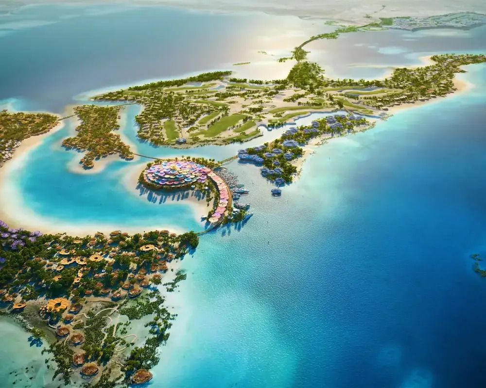 Aerial view of the turquoise Red Sea coastline with luxury resort development